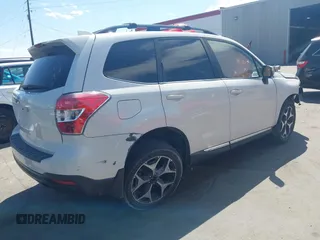 2016 Subaru Forester XT Touring with VIN JF2SJGXC5GH456474, listed as a IAAI auction lot 42320208 with 114,524 mi miles and . Bid and sale history available at DreamBid. Image 4.