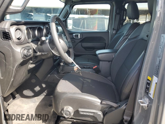 2023 Jeep Wrangler Willys Sport with VIN 1C4HJXDM6PW583932, listed as a Copart auction lot 75165174 with 7,624 mi miles and Salvage title. Bid and sale history available at DreamBid. Image 7.