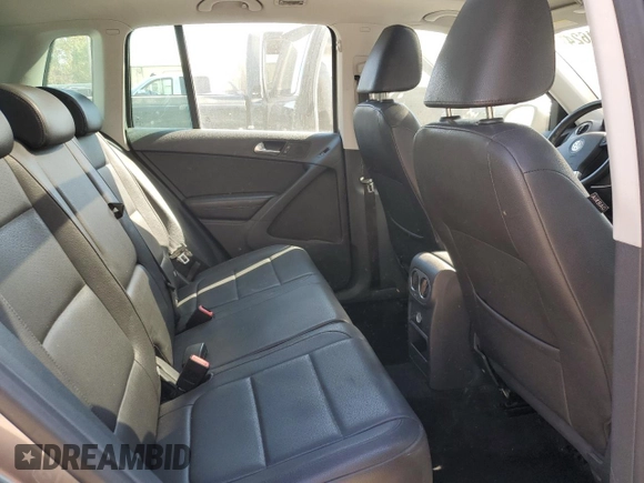 2010 Volkswagen Tiguan SEL with VIN WVGBV7AX2AW528700, listed as a Copart auction lot 76554624 with 134,566 mi miles and Salvage Title. Bid and sale history available at DreamBid. Image 11.
