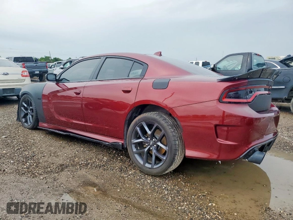 2021 Dodge Charger R/T with VIN 2C3CDXCT6MH504218, listed as a Copart auction lot 60407915 with 67,596 mi miles and Salvage title. Bid and sale history available at DreamBid. Image 2.