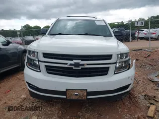 2018 Chevrolet Tahoe LT z VIN 1GNSKBKC9JR132670, wystawiony jako IAAI lot #42248273 z przebiegiem 136 636 mil mil oraz . Historia ofert i sprzedaży dostępna na DreamBid. Obrazek 12.