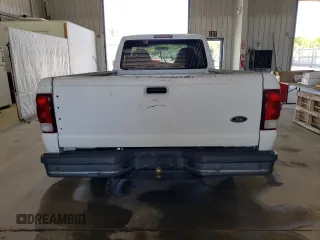 2000 Ford Ranger XL with VIN 1FTYR10V1YTA13232, listed as a Copart auction lot 54483055 with 217,473 mi miles and Salvage Title. Bid and sale history available at DreamBid. Image 6.