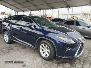 2016 Lexus RX 350 z VIN 2T2BZMCA6GC052982, wystawiony jako IAAI lot #42185246 z przebiegiem 125 518 mil mil oraz . Historia ofert i sprzedaży dostępna na DreamBid. Obrazek 1.