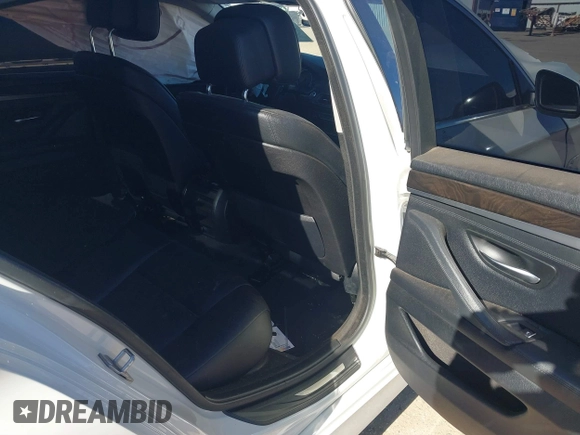 2013 BMW 5 Series 528i with VIN WBAXG5C59DDY32432, listed as a IAAI auction lot 41230673 with 103,069 mi miles and . Bid and sale history available at carsss.com. Image 8.
