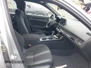 2023 Honda Civic Sport with VIN 2HGFE2F55PH501595, listed as a IAAI auction lot 42355942 with 8,924 mi miles and . Bid and sale history available at DreamBid. Image 5.