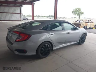 2017 Honda Civic Sedan LX with VIN 2HGFC2F5XHH506010, listed as a IAAI auction lot 39097533 with 193,718 mi miles. Bid and sale history available at carsss.com. Image 4.
