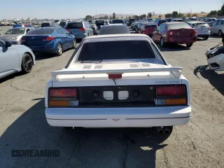 1986 Toyota MR2 z VIN JT2AW15CXG0080034, wystawiony jako Copart lot #73423944 z przebiegiem 54 316 mil mil oraz Szkody całkowita. Historia ofert i sprzedaży dostępna na DreamBid. Obrazek 6.