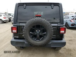 2022 Jeep Wrangler Unlimited Sport S with VIN 1C4HJXDG6NW141997, listed as a Copart auction lot 58938655 with 67,222 mi miles and Salvage title. Bid and sale history available at DreamBid. Image 7.