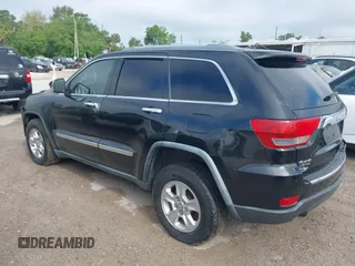 2011 Jeep Grand Cherokee Limited with VIN 1J4RR5GG1BC581520, listed as a IAAI auction lot 41916395 with 151,613 mi miles. Bid and sale history available at carsss.com. Image 3.