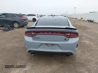 2020 Dodge Charger Scat Pack Widebody z VIN 2C3CDXGJ8LH216563, wystawiony jako IAAI lot #41502637 z przebiegiem Nie podano mil oraz . Historia ofert i sprzedaży dostępna na DreamBid. Obrazek 16.