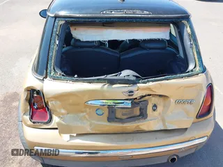 2004 MINI Hardtop with VIN WMWRC33474TC48930, listed as a IAAI auction lot 41657936 with 147,422 mi miles and . Bid and sale history available at DreamBid. Image 6.
