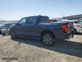 2023 Ford F-150 Lightning Pro with VIN 1FT6W1EV0PWG28960, listed as a Copart auction lot 51858855 with 0 mi miles and Non Repairable. Bid and sale history available at carsss.com. Image 2.