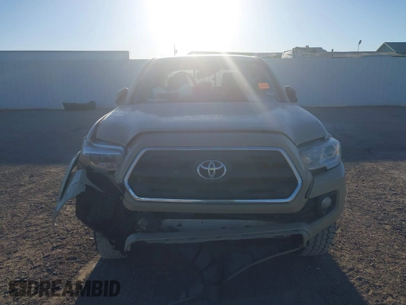 2017 Toyota Tacoma SR5 z VIN 5TFAZ5CN2HX039996, wystawiony jako IAAI lot #41406419 z przebiegiem 132 200 mil mil oraz . Historia ofert i sprzedaży dostępna na DreamBid. Obrazek 12.
