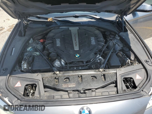 2014 BMW 5 Series 550i xDrive with VIN WBAKP9C51EDZ34830, listed as a Copart auction lot 59906435 with 123,709 mi miles and Salvage title. Bid and sale history available at DreamBid. Image 11.
