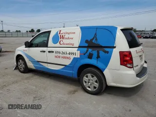 2013 Ram Cargo Van Tradesman with VIN 2C4JRGAG5DR784220, listed as a Copart auction lot 71394104 with 146,492 mi miles and Salvage Title. Bid and sale history available at carsss.com. Image 2.