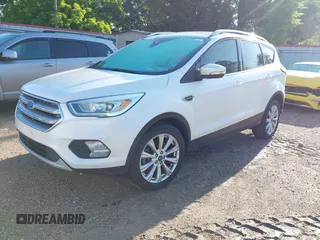 2017 Ford Escape Titanium with VIN 1FMCU0J90HUC51244, listed as a IAAI auction lot 42206165 with 106,847 mi miles and . Bid and sale history available at DreamBid. Image 17.