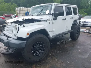 2016 Jeep Wrangler Unlimited Rubicon Hard Rock with VIN 1C4BJWFG3GL228449, listed as a IAAI auction lot 42158318 with Not provided miles and . Bid and sale history available at DreamBid. Image 2.