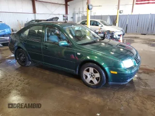 1999 Volkswagen Jetta GL z VIN 3VWRC29M2XM094970, wystawiony jako Copart lot #52618145 z przebiegiem Nie podano mil oraz Szkoda całkowita • Salvage title. Historia ofert i sprzedaży dostępna na DreamBid. Obrazek 4.