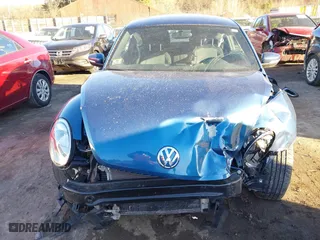 2019 Volkswagen Beetle S with VIN 3VWFD7AT5KM708953, listed as a IAAI auction lot 41440200 with 54,430 mi miles. Bid and sale history available at carsss.com. Image 13.