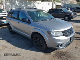2017 Dodge Journey SXT z VIN 3C4PDCBB4HT560508, wystawiony jako IAAI lot #42315718 z przebiegiem 152 666 mil mil oraz . Historia ofert i sprzedaży dostępna na DreamBid. Obrazek 1.