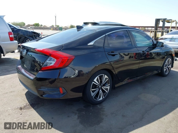 2018 Honda Civic EX-T z VIN 19XFC1F35JE200003, wystawiony jako IAAI lot #42393392 z przebiegiem 90 337 mil mil oraz . Historia ofert i sprzedaży dostępna na DreamBid. Obrazek 4.
