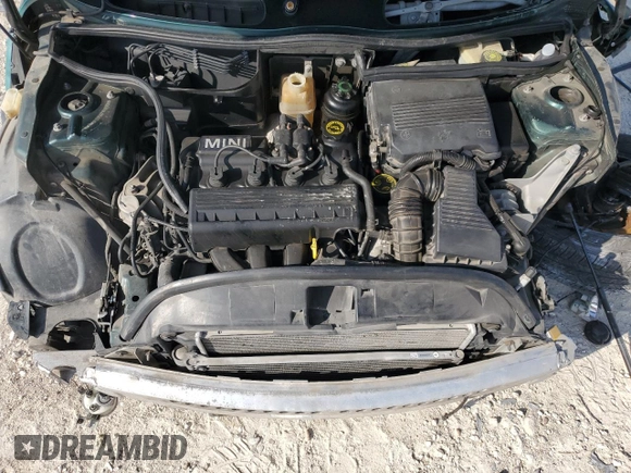 2007 MINI Convertible with VIN WMWRF33567TF66784, listed as a Copart auction lot 71571744 with 115,008 mi miles and Salvage Title. Bid and sale history available at DreamBid. Image 12.