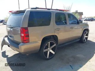 2007 Chevrolet Tahoe LT z VIN 1GNFC13077R226276, wystawiony jako IAAI lot #42232796 z przebiegiem 169 595 mil mil oraz . Historia ofert i sprzedaży dostępna na DreamBid. Obrazek 4.