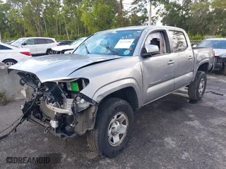 2019 Toyota Tacoma 2WD SR with VIN 5TFAX5GNXKX139433, listed as a IAAI auction lot 41131196 with 106,578 mi miles. Bid and sale history available at carsss.com. Image 19.