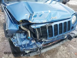 2005 Jeep Liberty Sport with VIN 1J4GL48K45W599048, listed as a IAAI auction lot 41603457 with 107,781 mi miles. Bid and sale history available at carsss.com. Image 6.