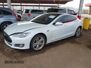 2013 Tesla Model S с VIN 5YJSA1CG8DFP22036, выставлен на аукционе IAAI как лот 41886249 с пробегом 125 477 миль миль и . История ставок и продаж доступна на DreamBid. Изображение 2.