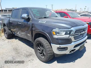 2019 Ram 1500 Laramie with VIN 1C6SRFJT5KN640518, listed as a IAAI auction lot 42565462 with 124,382 mi miles and . Bid and sale history available at DreamBid. Image 1.