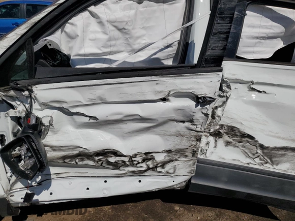 2021 Volkswagen Tiguan S z VIN 3VV1B7AX8MM065752, wystawiony jako Copart lot #62013905 z przebiegiem Nie podano mil oraz Szkoda całkowita • Salvage title. Historia ofert i sprzedaży dostępna na DreamBid. Obrazek 7.
