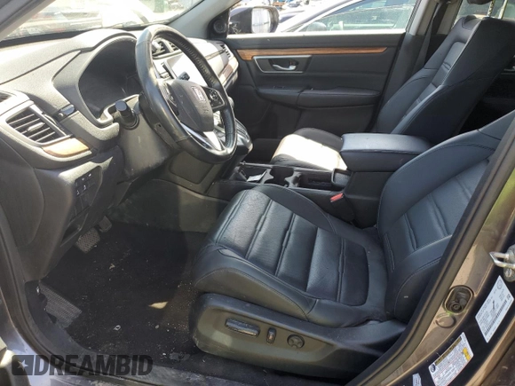 2019 Honda CR-V Touring with VIN 2HKRW2H90KH149664, listed as a Copart auction lot 52019525 with 147,649 mi miles and Salvage Title. Bid and sale history available at DreamBid. Image 7.