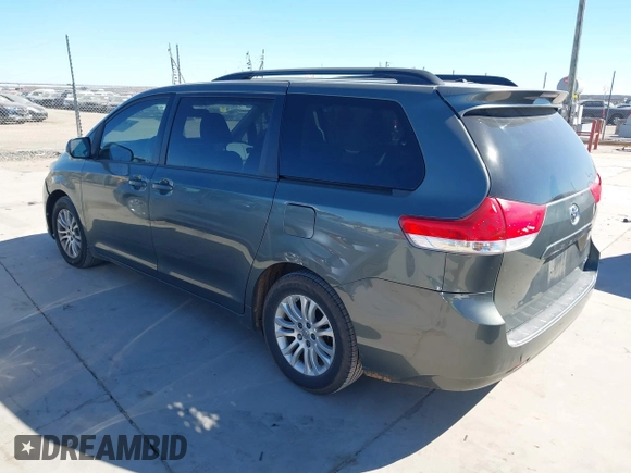 2013 Toyota Sienna XLE AAS with VIN 5TDYK3DCXDS379272, listed as a IAAI auction lot 41407282 with 240,491 mi miles and . Bid and sale history available at carsss.com. Image 3.