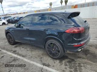 2017 Porsche Cayenne S E-Hybrid with VIN WP1AE2A26HLA74128, listed as a Copart auction lot 46486355 with 57,482 mi miles and Salvage title. Bid and sale history available at DreamBid. Image 2.