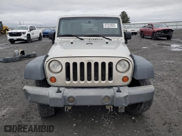 2007 Jeep Wrangler Unlimited Rubicon с VIN 1J8GA691X7L191115, выставлен на аукционе Copart как лот 87523925 с пробегом 85 709 миль миль и Списание • Salvage title. История ставок и продаж доступна на DreamBid. Изображение 5.