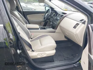2012 Mazda CX-9 Grand Touring z VIN JM3TB3DV1C0360212, wystawiony jako IAAI lot #42232584 z przebiegiem 99 582 mil mil oraz . Historia ofert i sprzedaży dostępna na DreamBid. Obrazek 5.