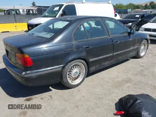 2000 BMW 5 Series 528i with VIN WBADM6349YGU29547, listed as a IAAI auction lot 42138468 with 207,469 mi miles and . Bid and sale history available at DreamBid. Image 4.