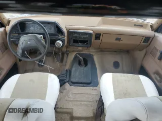 1988 Ford Bronco XL with VIN 1FMEU15N3JLA20890, listed as a Copart auction lot 79555004 with 0 mi miles and Salvage Title. Bid and sale history available at carsss.com. Image 8.