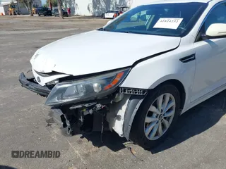 2015 Kia Optima LX with VIN KNAGM4A72F5616233, listed as a IAAI auction lot 41824232 with 163,006 mi miles. Bid and sale history available at carsss.com. Image 6.