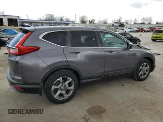 2018 Honda CR-V EX with VIN 7FARW1H51JE052272, listed as a Copart auction lot 49498945 with 61,324 mi miles and Salvage Title. Bid and sale history available at DreamBid. Image 3.