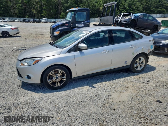 2013 Ford Focus SE with VIN 1FADP3F22DL323418, listed as a Copart auction lot 61859225 with 62,415 mi miles and Salvage title. Bid and sale history available at DreamBid. Image 1.
