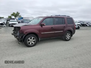 2011 Honda Pilot Touring z VIN 5FNYF3H92BB039165, wystawiony jako Copart lot #59596105 z przebiegiem 182 944 mil mil oraz Szkoda całkowita • Salvage title. Historia ofert i sprzedaży dostępna na DreamBid. Obrazek 1.