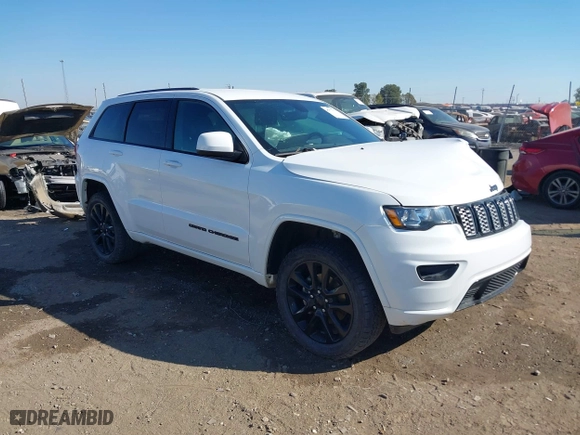 2018 Jeep Grand Cherokee Laredo E with VIN 1C4RJFAGXJC435658, listed as a IAAI auction lot 40659459 with 97,827 mi miles. Bid and sale history available at carsss.com. Image 1.