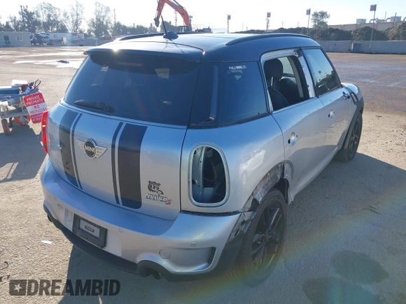 2013 MINI Countryman S ALL4 with VIN WMWZC5C58DWP30774, listed as a IAAI auction lot 41637209 with 101,540 mi miles and . Bid and sale history available at DreamBid. Image 4.