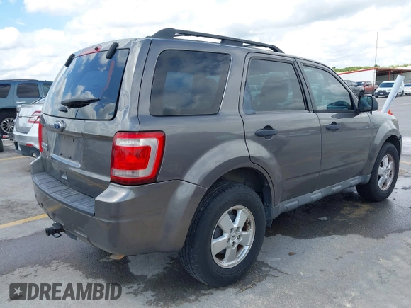 2012 Ford Escape XLS with VIN 1FMCU0C75CKA40329, listed as a IAAI auction lot 42494805 with 223,218 mi miles and . Bid and sale history available at DreamBid. Image 4.