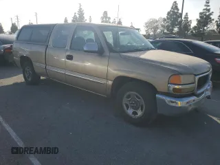 2000 GMC Sierra 1500 SL with VIN 2GTEC19V8Y1236039, listed as a Copart auction lot 87257984 with Not Provided miles and Clean Title. Bid and sale history available at DreamBid. Image 4.