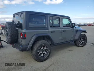 2020 Jeep Wrangler Unlimited Rubicon with VIN 1C4HJXFN9LW156972, listed as a Copart auction lot 50666195 with 13,834 mi miles and Salvage title. Bid and sale history available at DreamBid. Image 3.