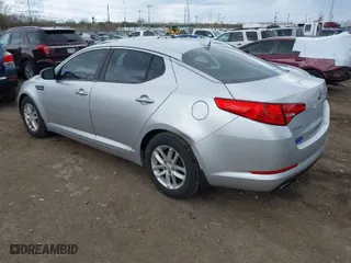 2012 Kia Optima LX with VIN KNAGM4A70C5280464, listed as a IAAI auction lot 41881578 with 141,494 mi miles. Bid and sale history available at carsss.com. Image 3.