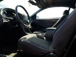 2002 Ford Mustang Deluxe с VIN 1FAFP44492F212928, выставлен на аукционе Copart как лот 49112315 с пробегом 250 893 миль миль и Чистый • Clean title. История ставок и продаж доступна на DreamBid. Изображение 7.